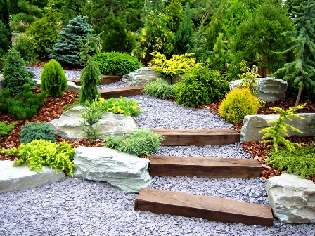 An image of decorative stones forming a set of steps in a garden.